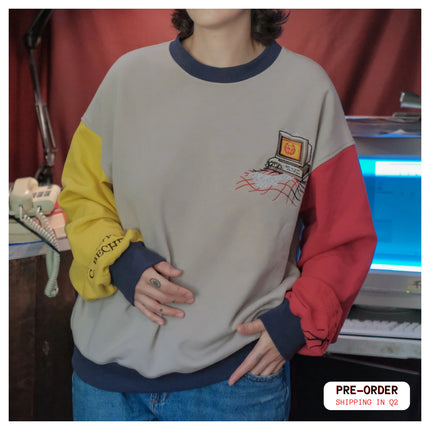 Red, grey, yellow, and navy oversized, drop shoulder, straight sleeve, jersey crewneck in 100% cotton, with embroidered details.