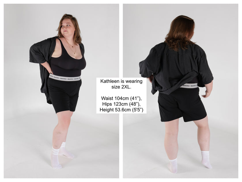 Knock Thrice Knoxers // black cotton, fitted, unisex boxer briefs. The boxers are mid-high rise,  and have a grey spandex waistband that reads 