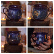 Two intricately designed witches cottage ceramic mugs, featuring vibrant seasonal and whimsical artwork. The top mug showcases an autumnal theme with pumpkins and fall foliage, while the bottom mug highlights an autumnal evening scene with a full moon, a prowling cat, and dark, enchanting colors.