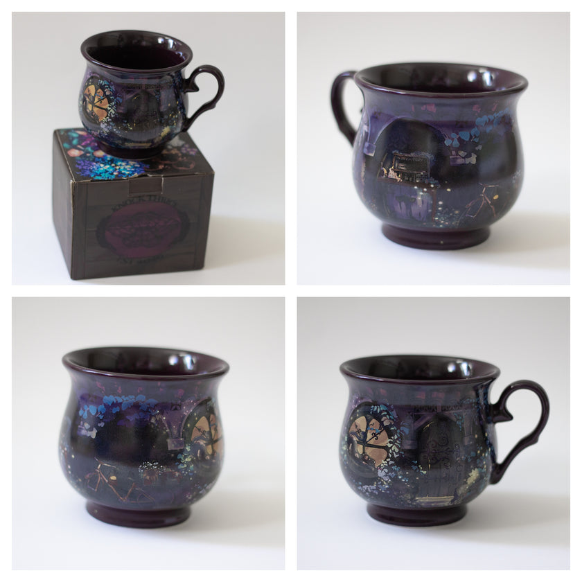 Deep plum-purple, heat-sealed 360Â° printed mug of a witchâ€™s cottage at night, featuring a mystical design with a glowing full moon, the forest glinting in the moonlight, a kitten rising for a midnight prowl, and an enchanting arched doorway. Microwave and dishwasher safe. They are a rounded shape with a wide lip, to keep your hands cozy all winter long.  