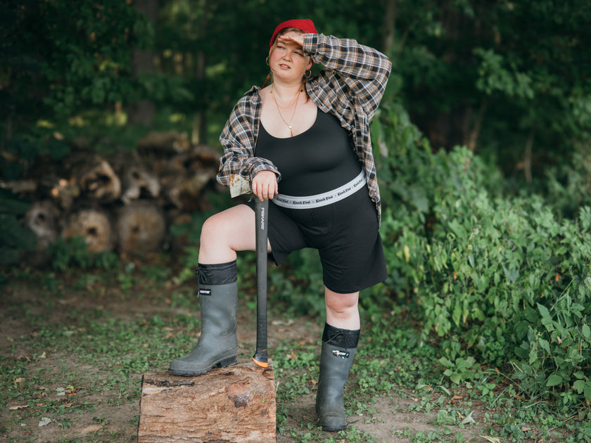 Knock Thrice Knoxers // black cotton, fitted, unisex boxer briefs. The boxers are mid-high rise,  and have a grey spandex waistband that reads 