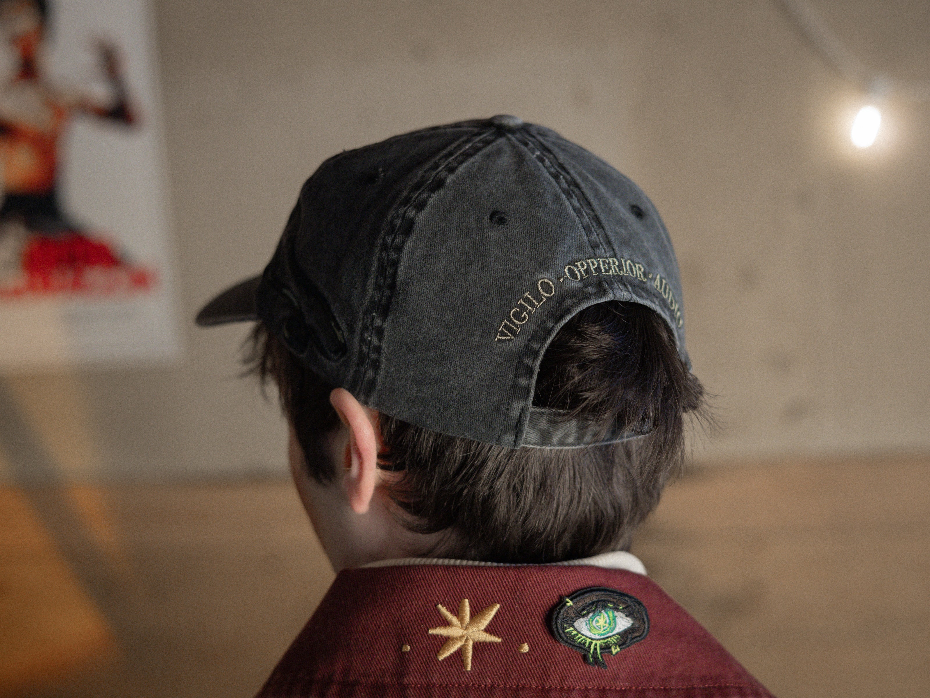 Black and green 100% cotton, 6-panel dad cap. Low profile, one size, with embroidered detailing on the front and back