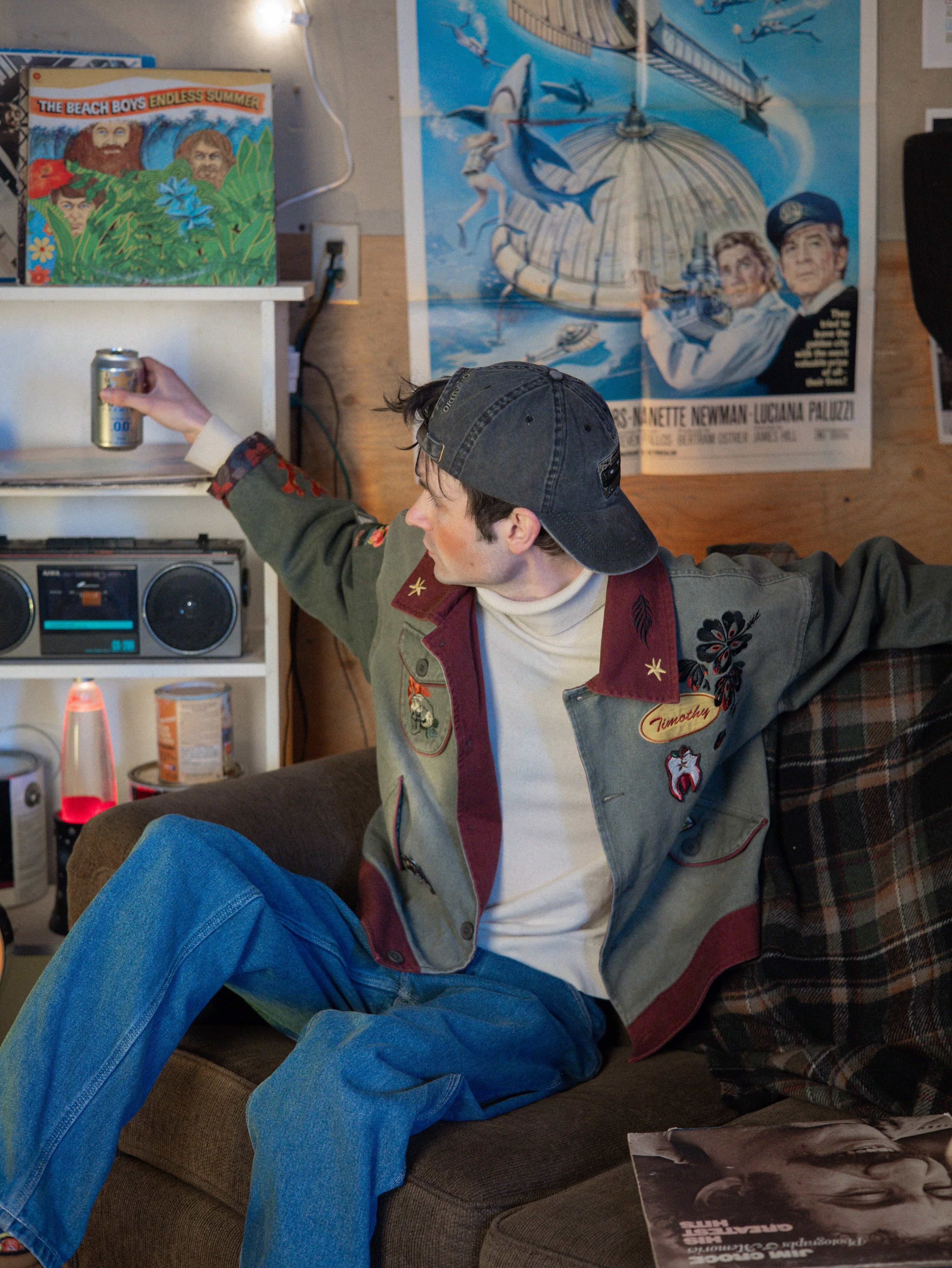 Black and green 100% cotton, 6-panel dad cap. Low profile, one size, with embroidered detailing on the front and back