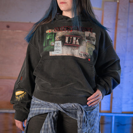 Rusty Quill X Knock Thrice 100% cotton hoodie in black, with a boxy, oversized, slightly cropped fit. The hoodie features both printed and embroidered details.