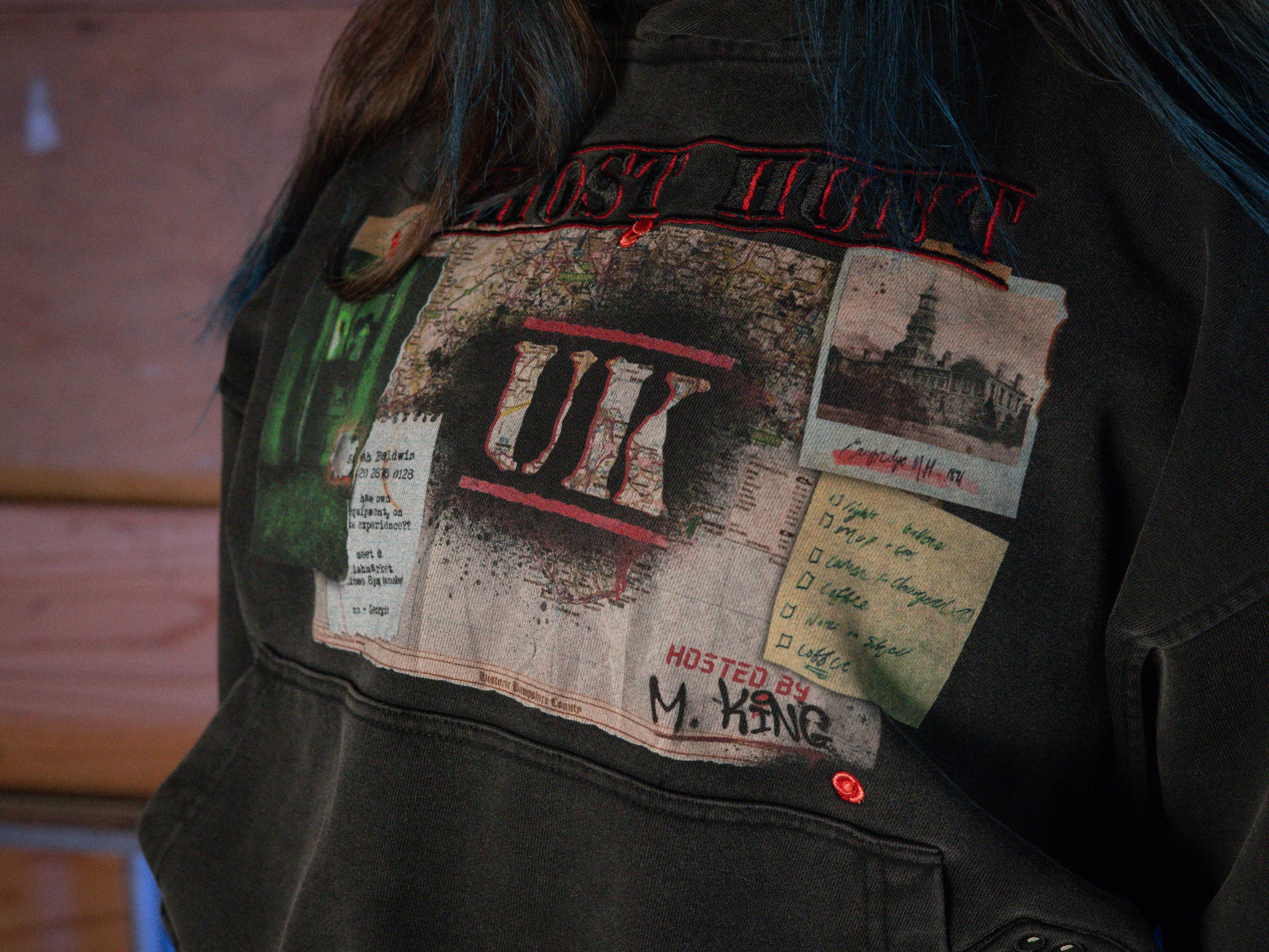 Rusty Quill X Knock Thrice 100% cotton hoodie in black, with a boxy, oversized, slightly cropped fit. The hoodie features both printed and embroidered details.