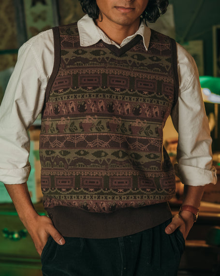 Magnus Archives x Knock Thrice knitted v-neck vest in dark green brown, and burgundy, made of 100% cotton.