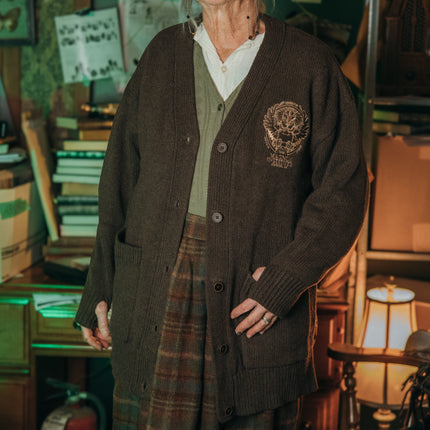 Magnus Archives x Knock Thrice oversized knit cardigan with embroidered details in dark brown. Made of 60% Cotton 30% Nylon 10% Wool.