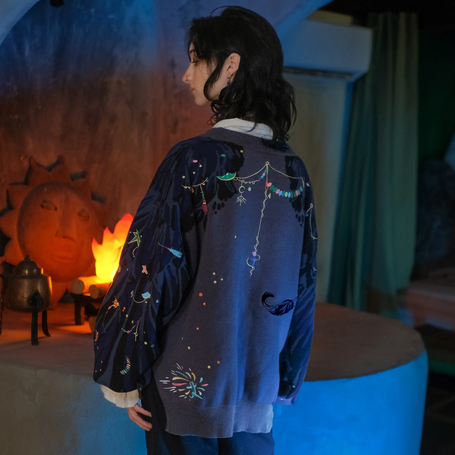100% cotton cardigan, with a classic puff sleeve design, featuring a boxy, oversize fit with wide, loose hips, and embroidered details.