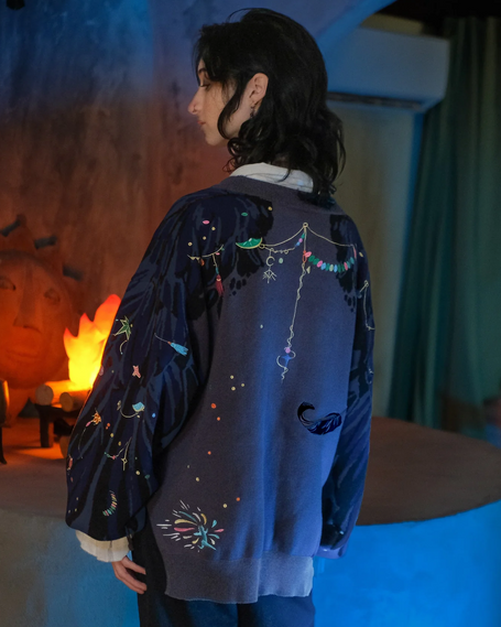 100% cotton cardigan, with a classic puff sleeve design, featuring a boxy, oversize fit with wide, loose hips, and embroidered details.